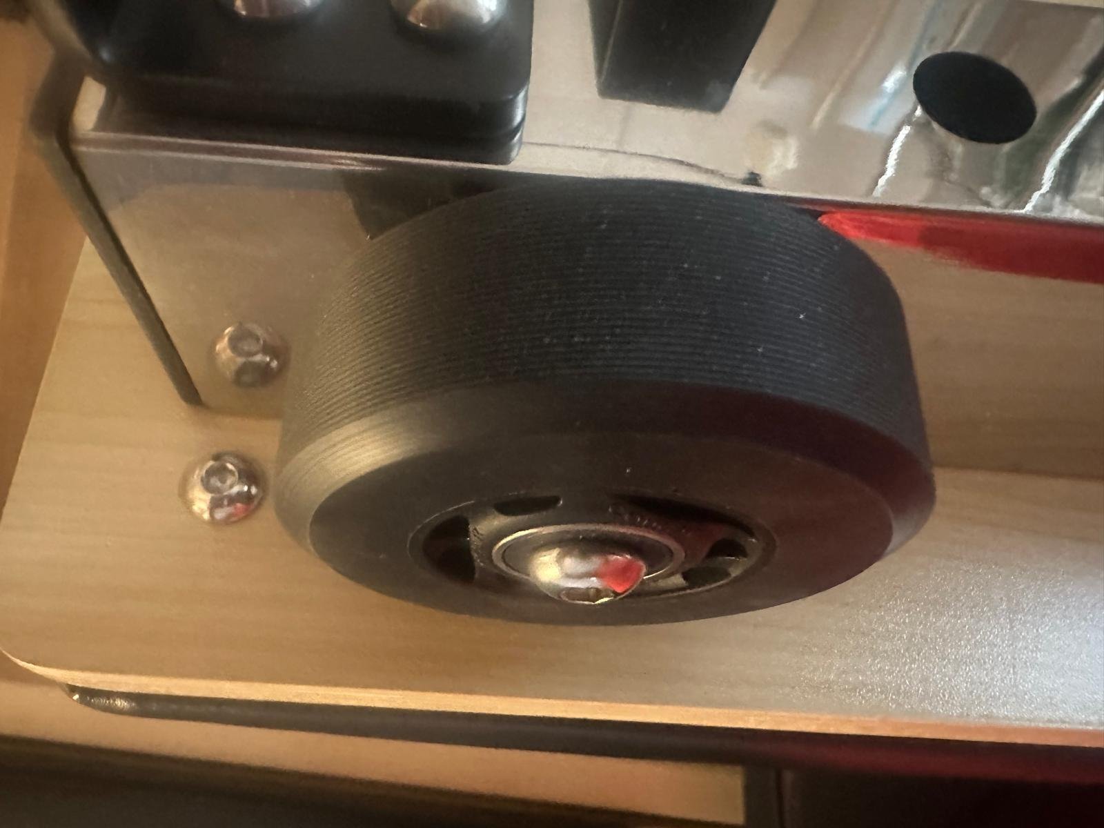Close-up of a Pilates Reformer carriage wheel